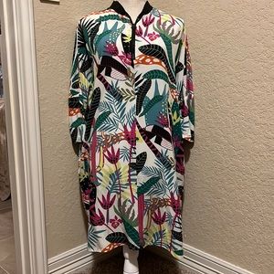 Medicine Size S/M tunic . Runs bigger. Tropical print. Came from Europe .
